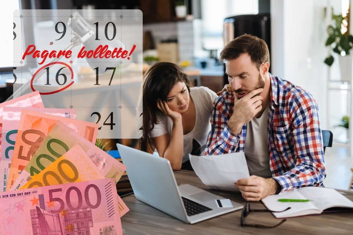 coppia che legge le bollette con banconote rosse e calendario segnato con pagamento bolletta